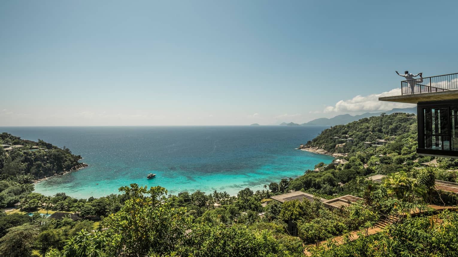Aerial view of resort tropical forest and turquoise lagoon