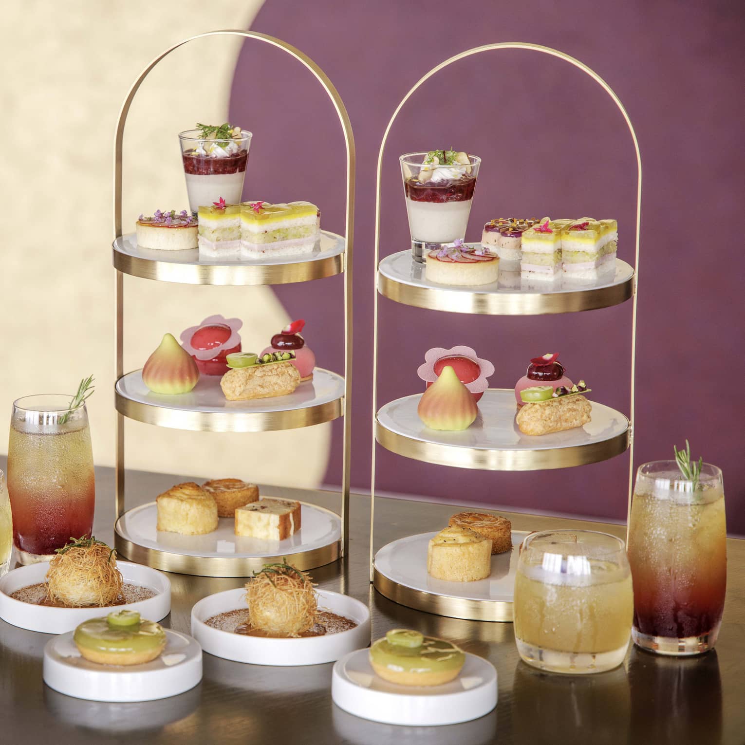 Afternoon tea spread on a table, featuring muscat grapes