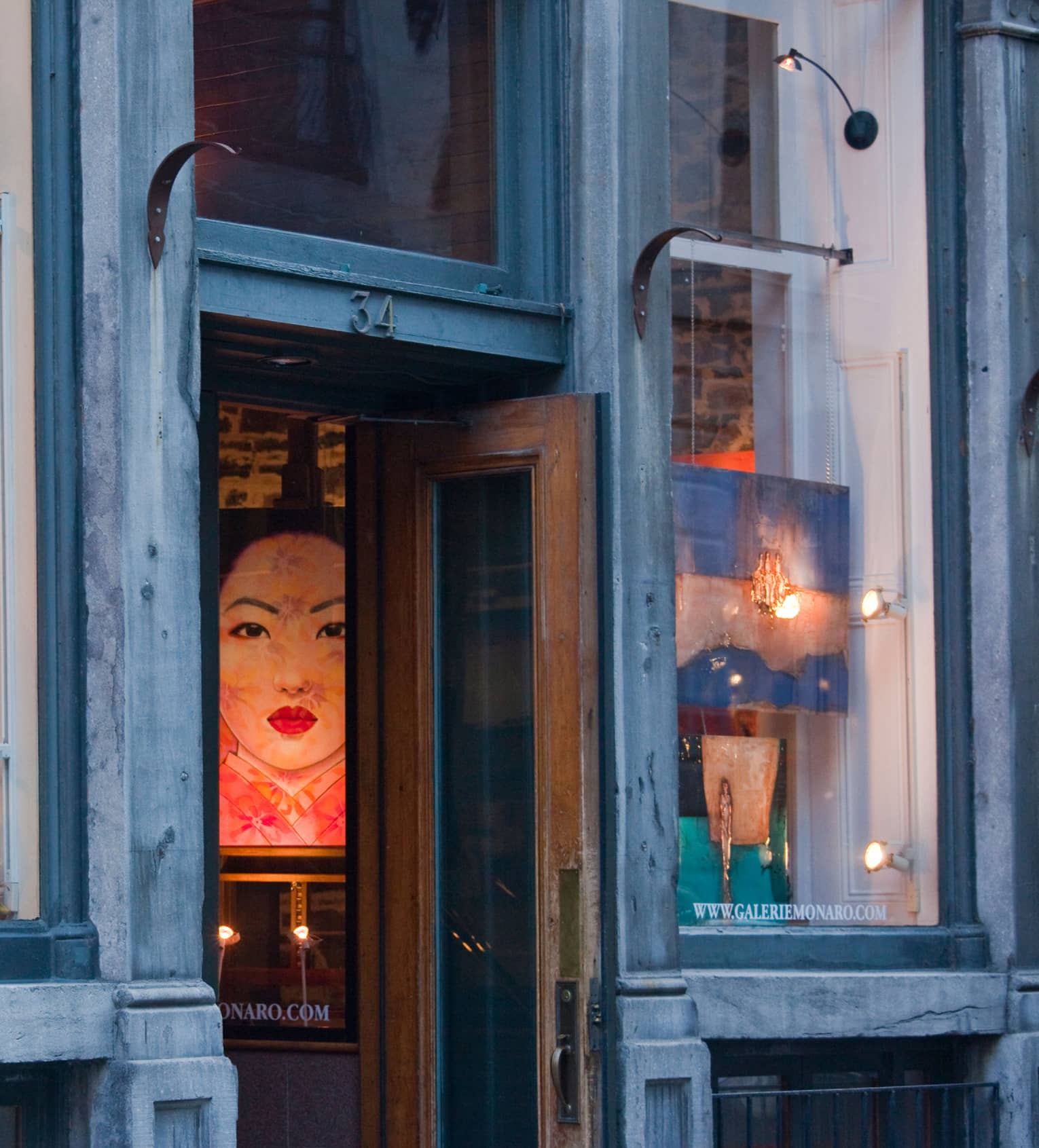 Paintings in the window of Old Montreal art gallery