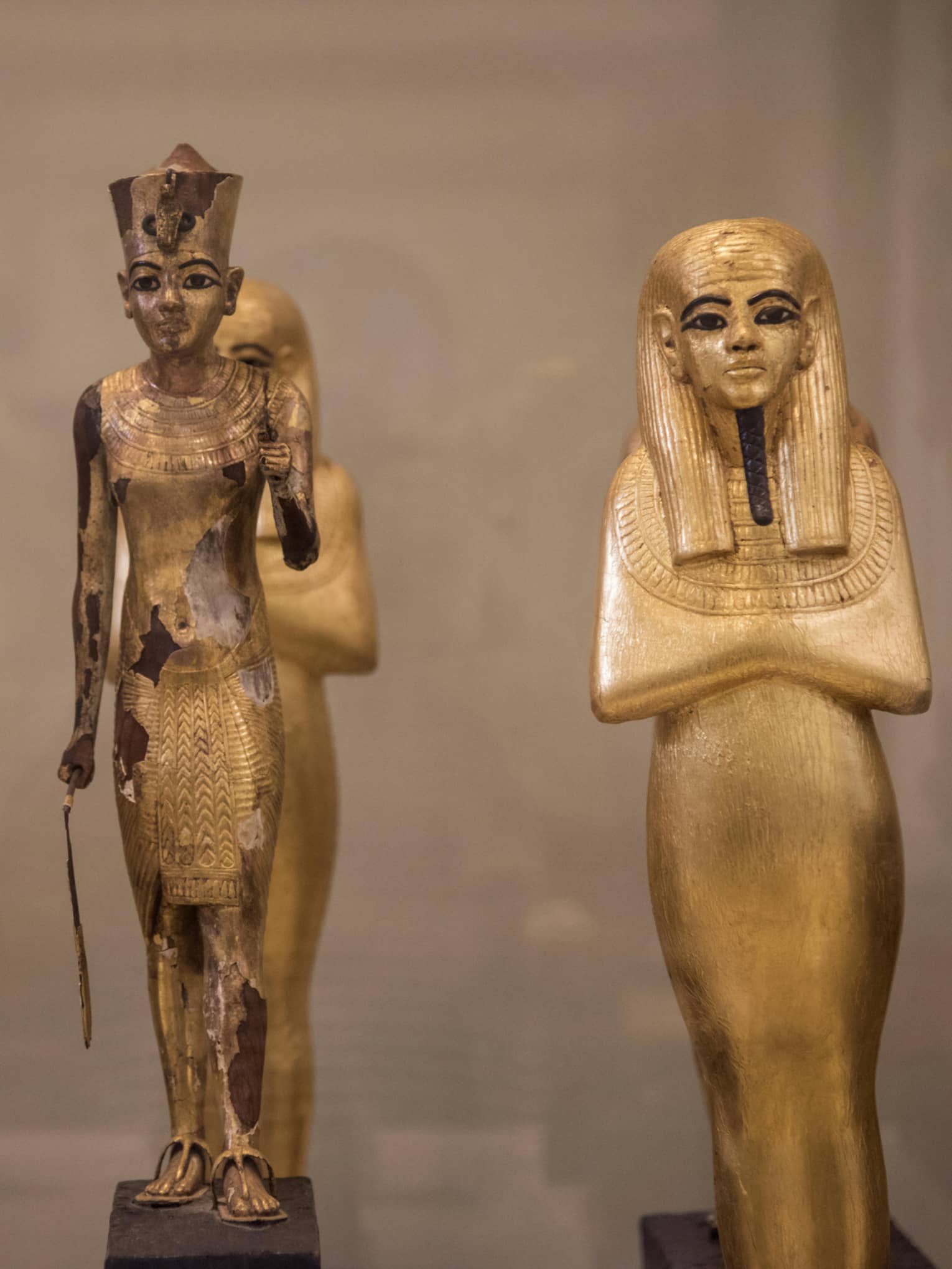 Three Egyptian statues in museum