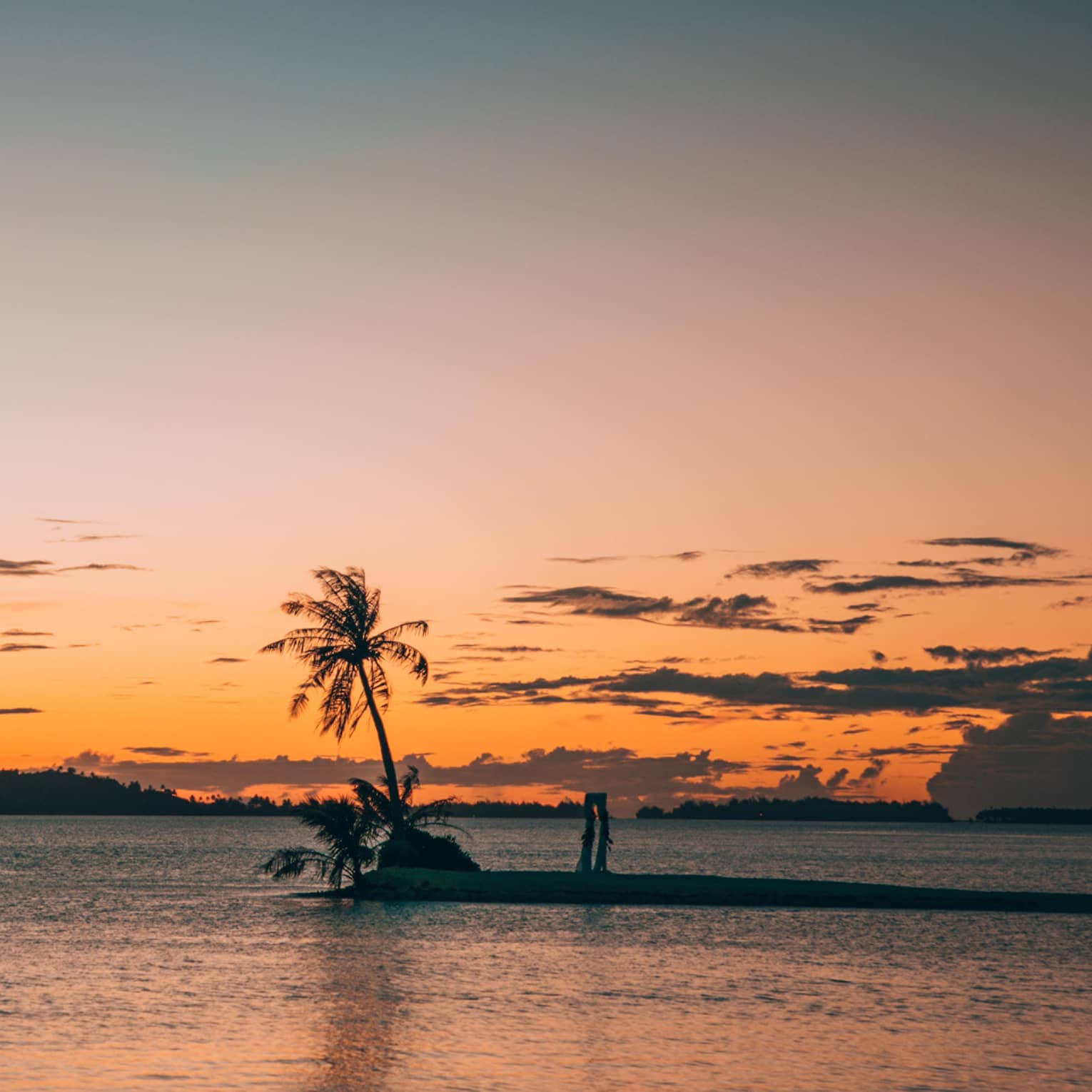A sunset over an ocean.
