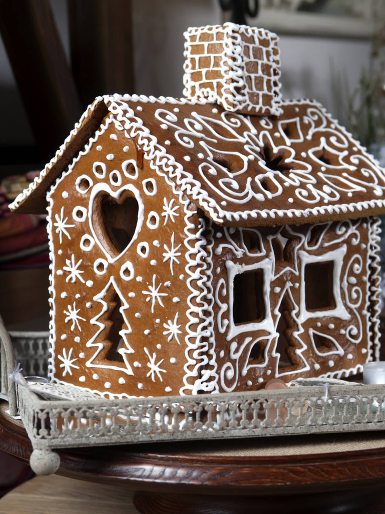 Gingerbread house decorated with white frosting