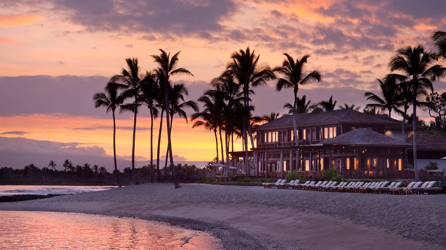 The beachside resort at sunset