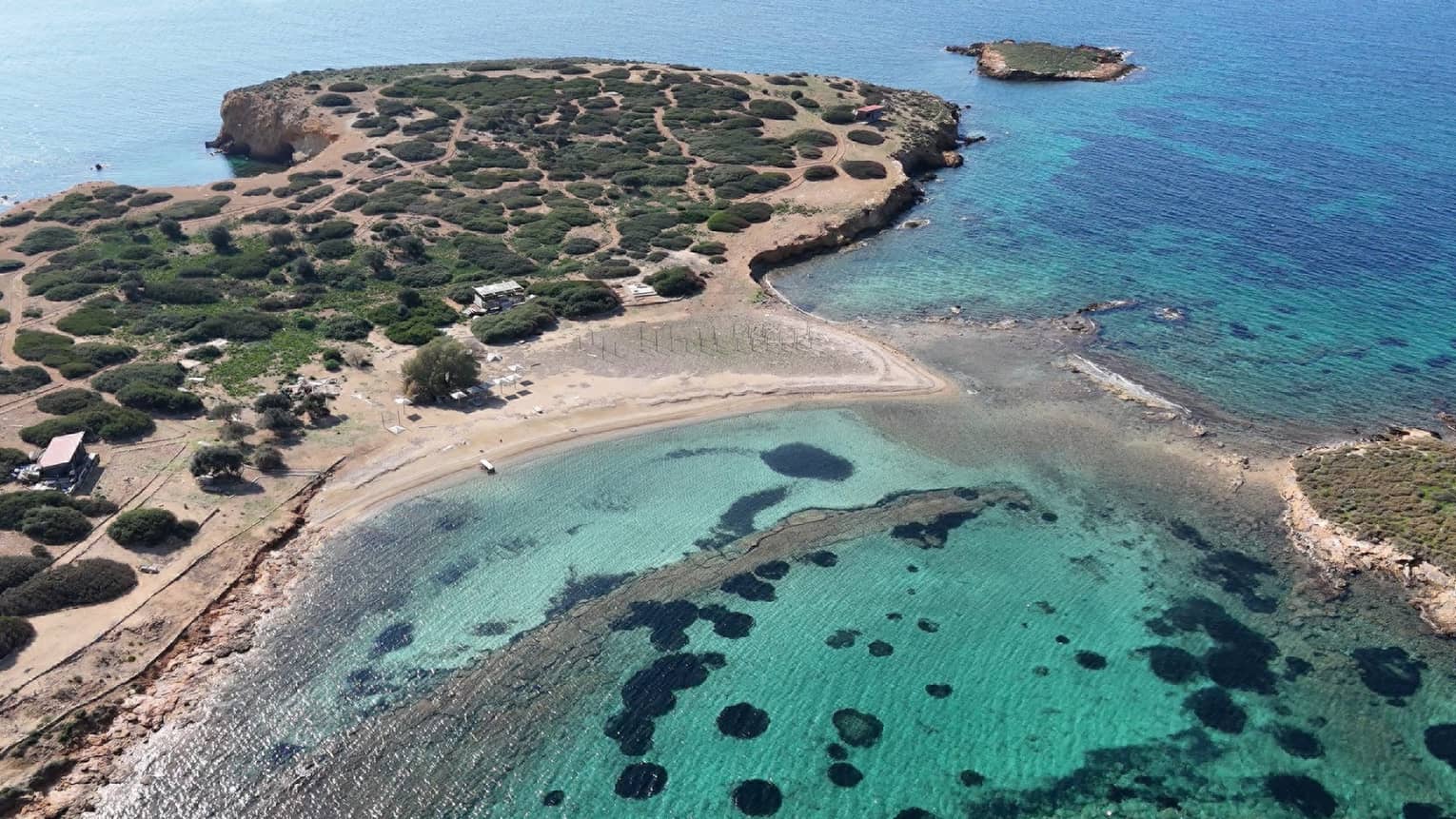 Aerial view of blue-green waters of peninsula