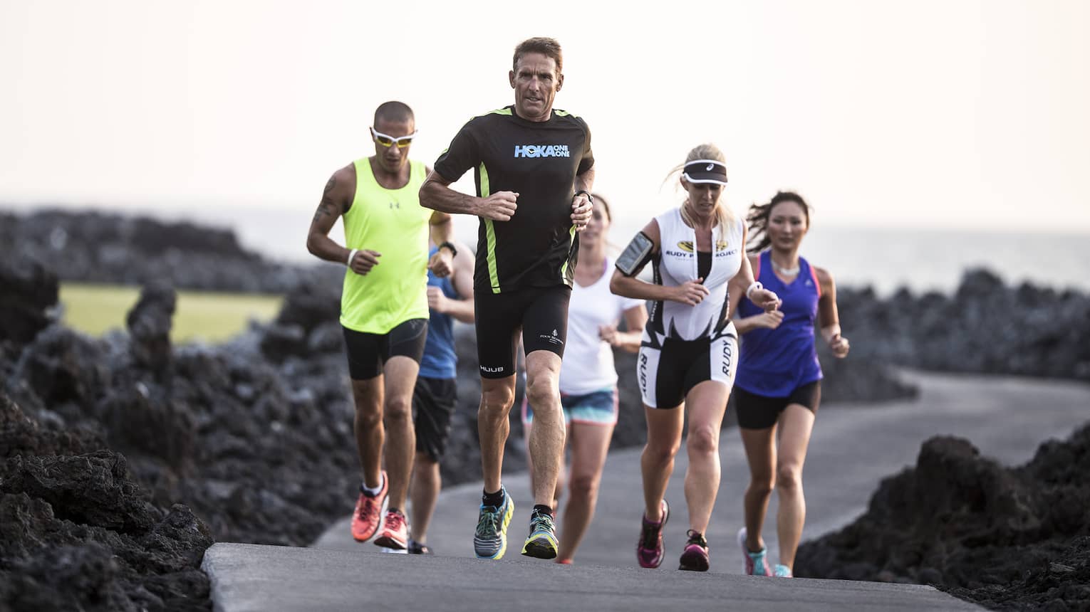 Guests running past volcanic ash with Dave Scott for his specialty triathlon training