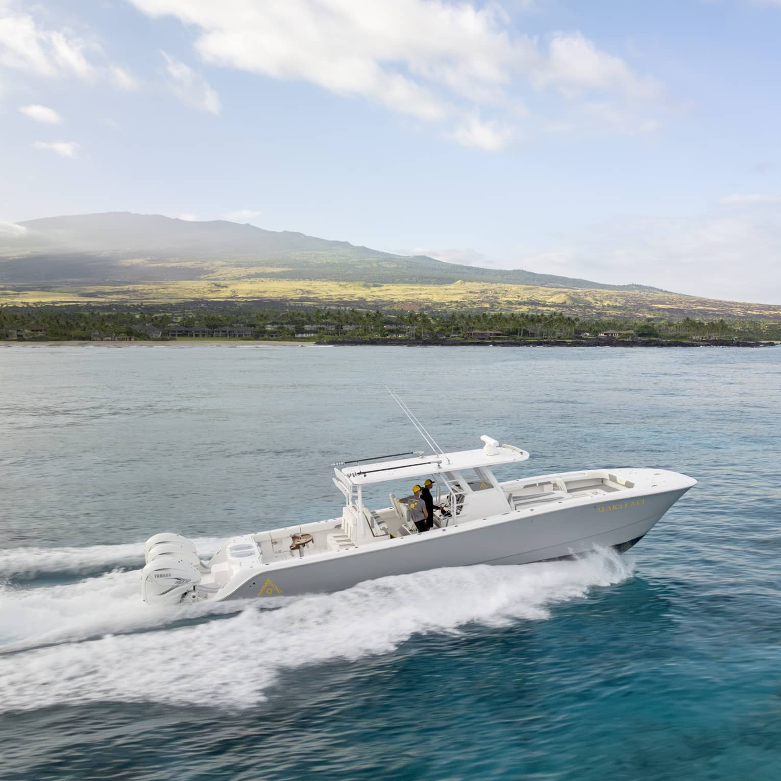 Boat on the water along Hawaii Island coast