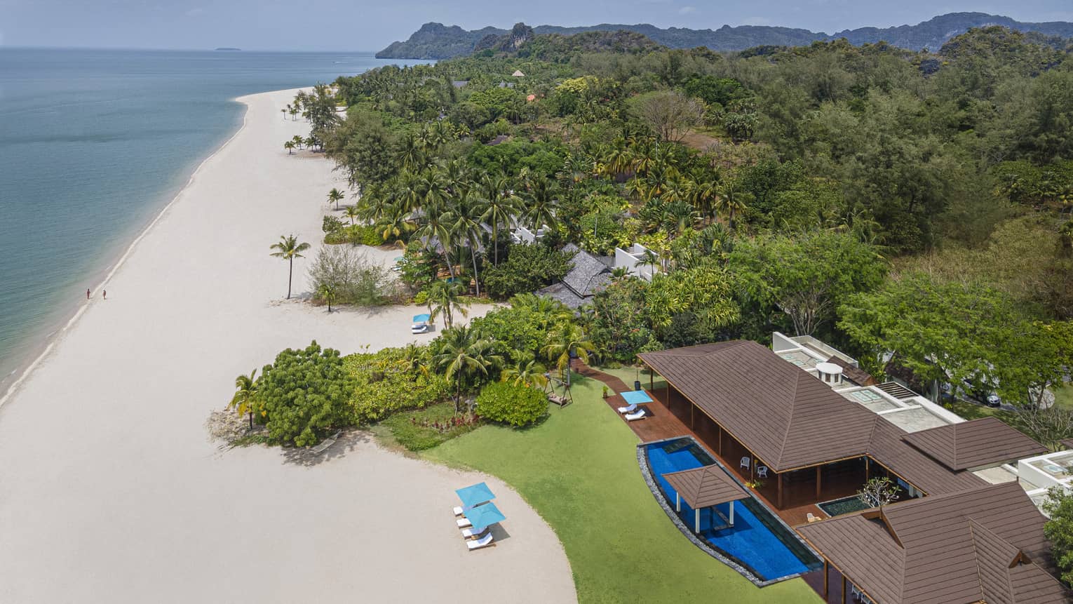 Aerial view of a private villa on beach in Langkawi