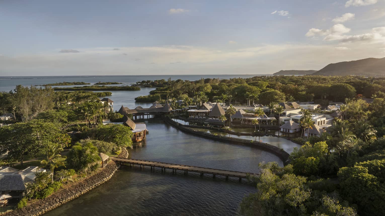 Aerial view of the property and surrounding landscape