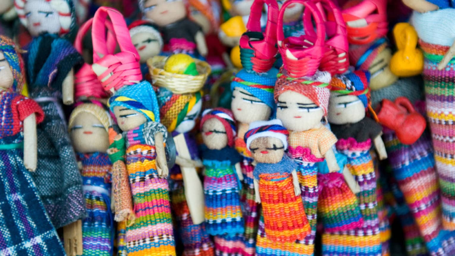 Colourful woven dolls