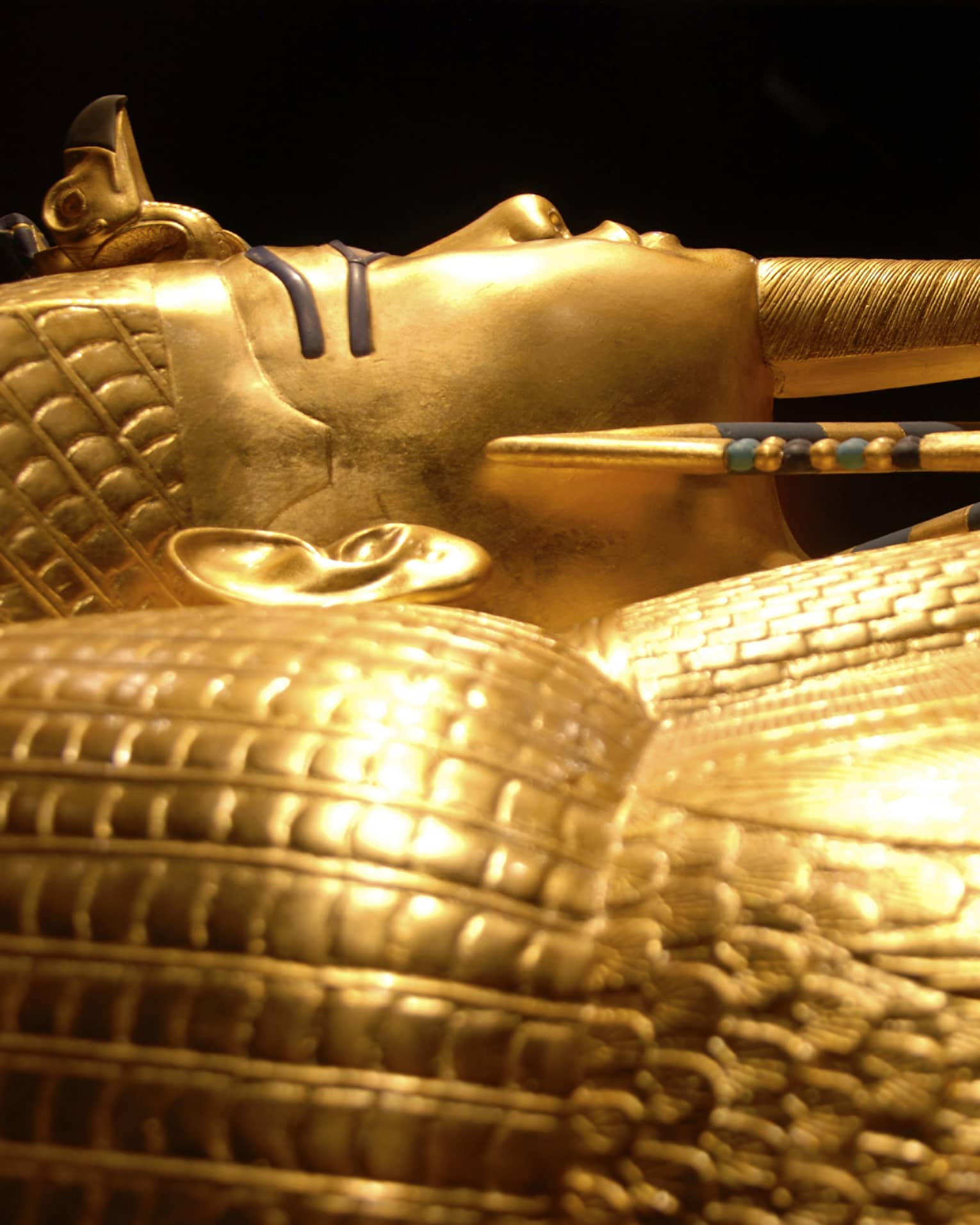 Side view of gold Pharaoh King Tutankhamun tomb in Cairo Egyptian Museum