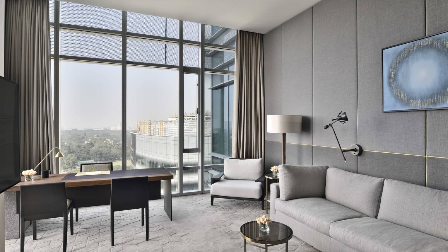 Sitting area with sofa and desk