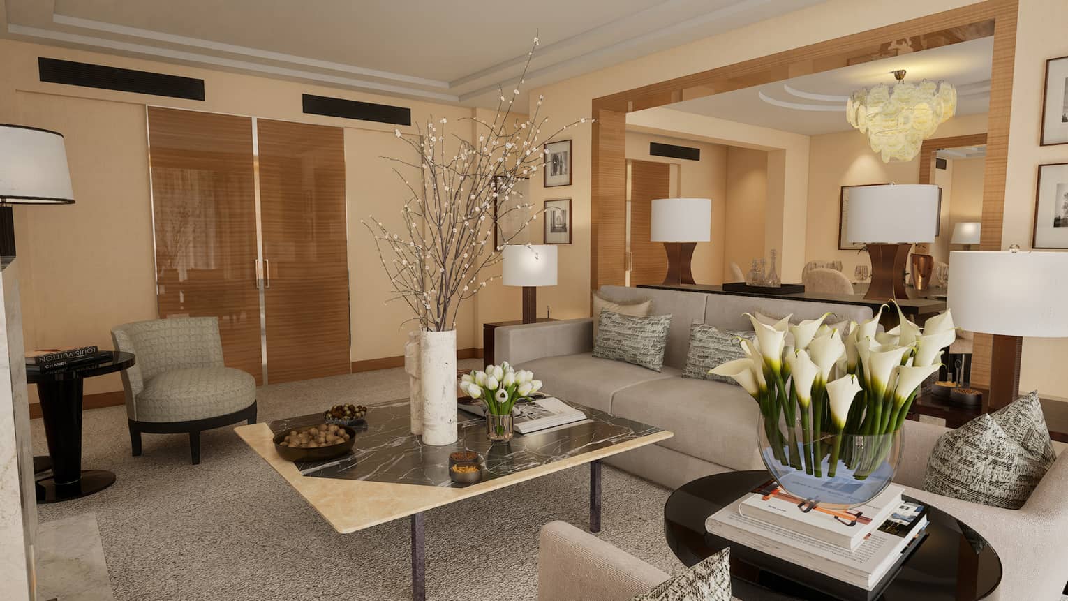 Hotel living room with sofa, arm chairs and large square table
