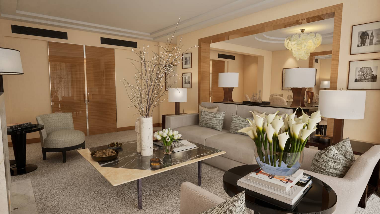 Hotel living room with sofa, arm chairs and large square table