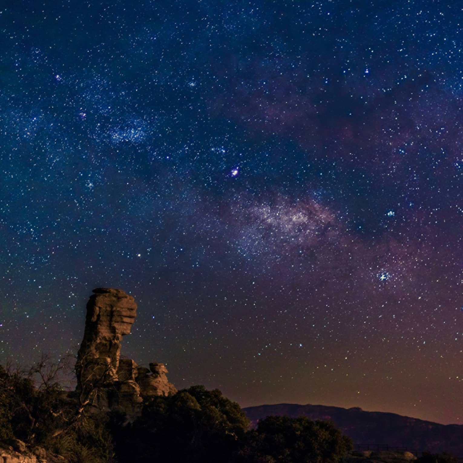 Clear, starry night sky over desert