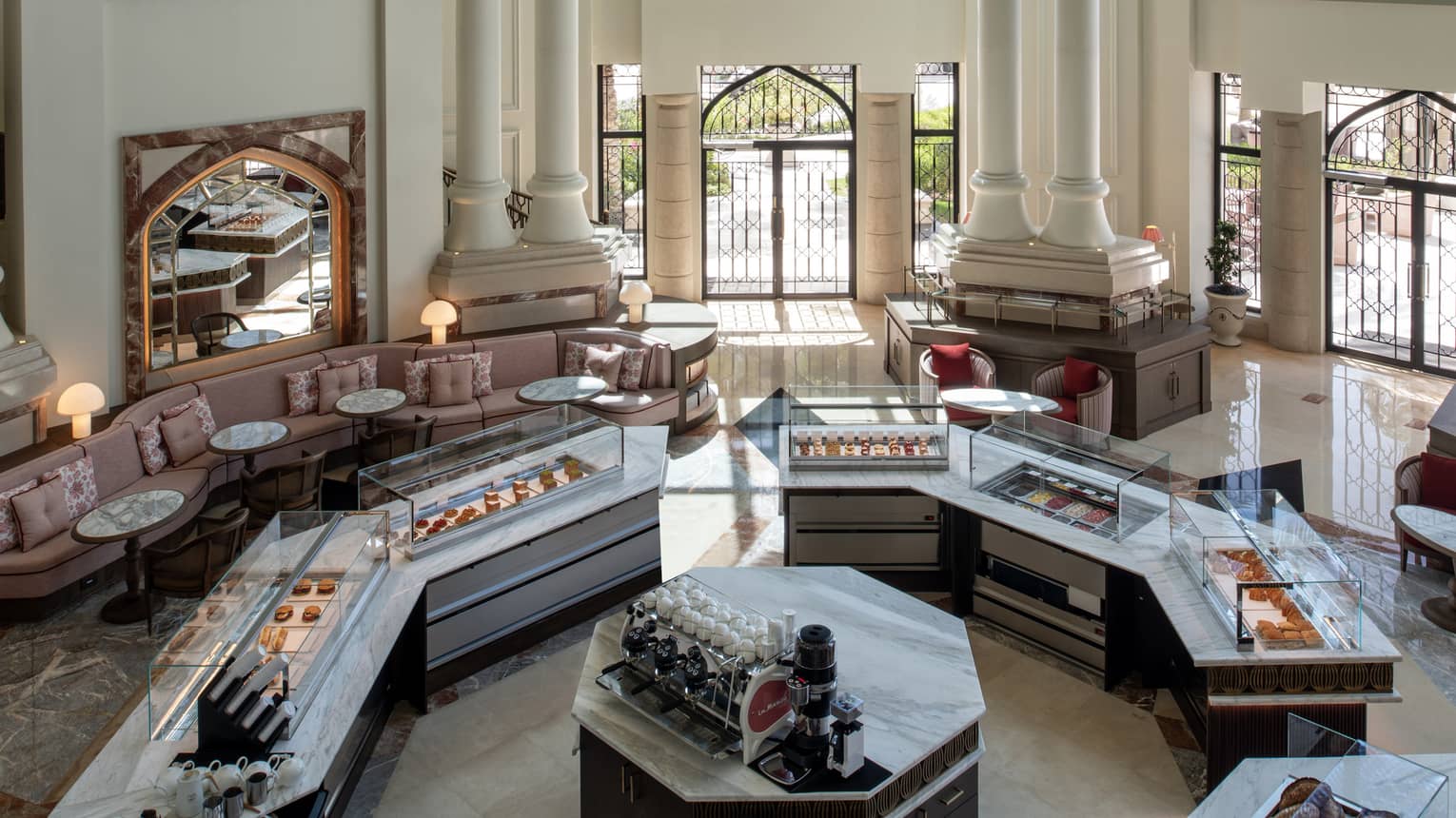 Overhead view of bakery counters centrally located in a large atrium