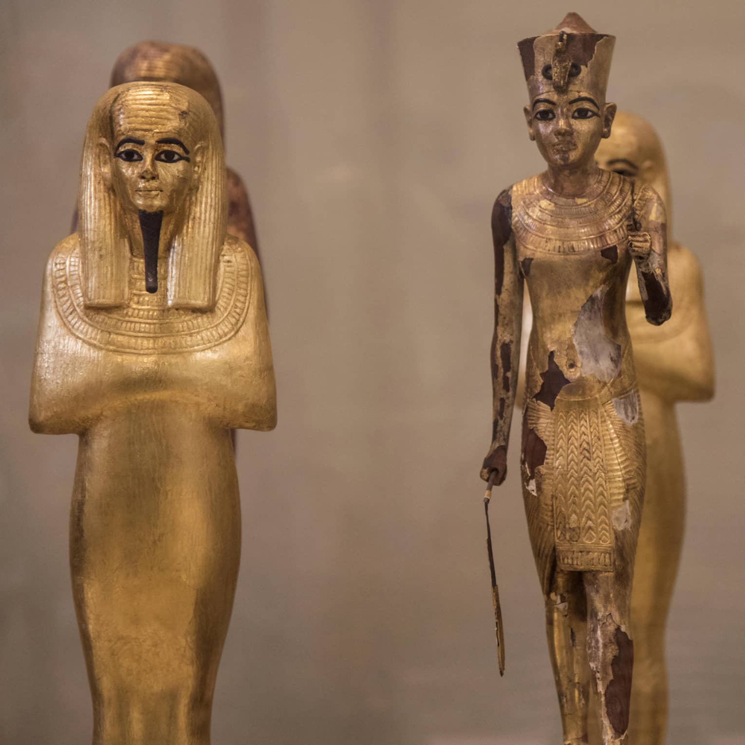 Three Egyptian statues in museum