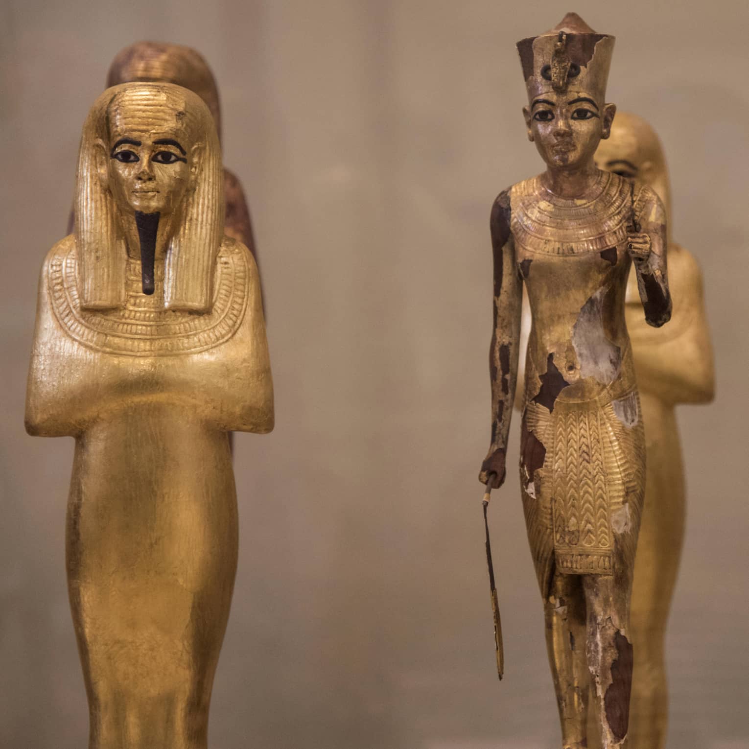 Three Egyptian statues in museum