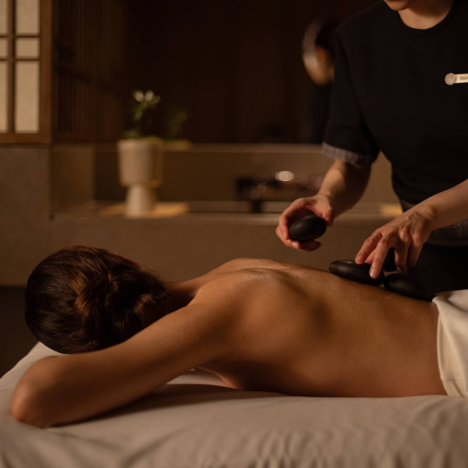 Woman received hot stone treatment