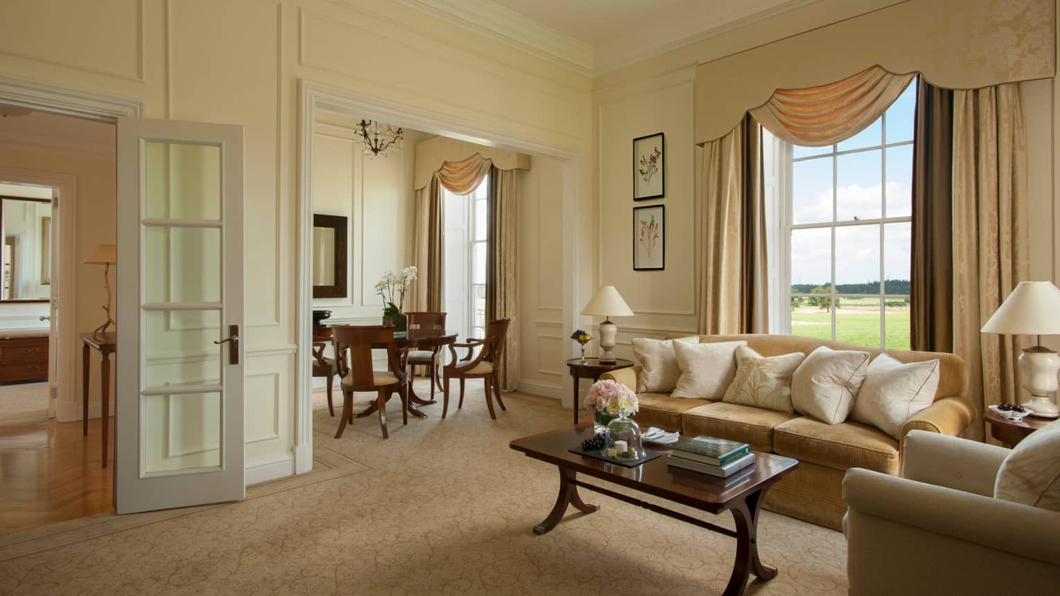 Ellis St. John Suite living room sofas, doorways to dining room, hall