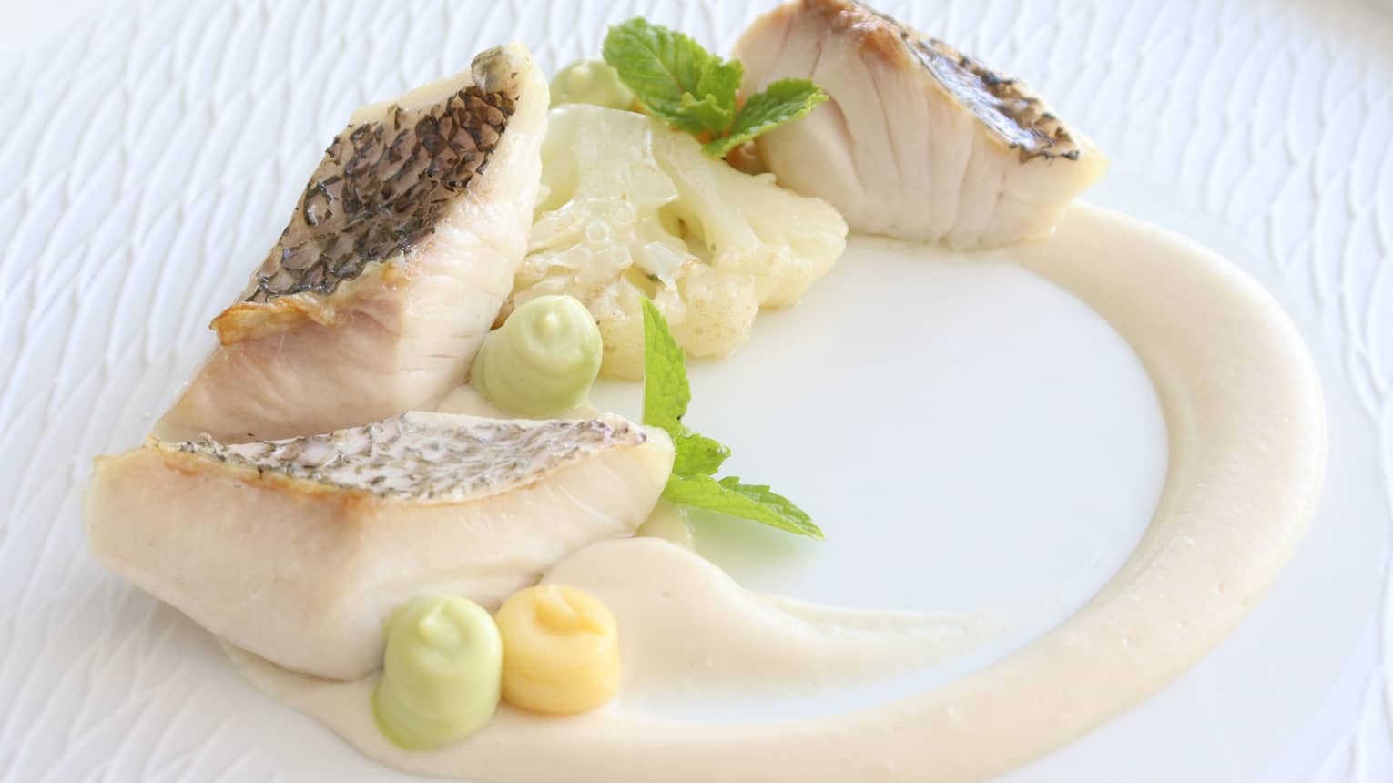 Slow-cooked Rainbow Runner with Cauliflower, Dill and Roasted Lemon