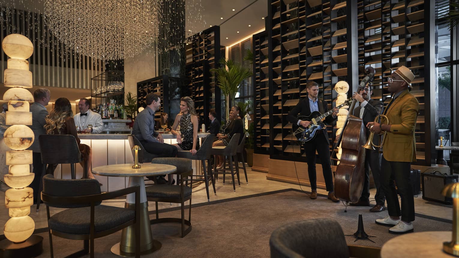A live band and a group of people in a restaurant.
