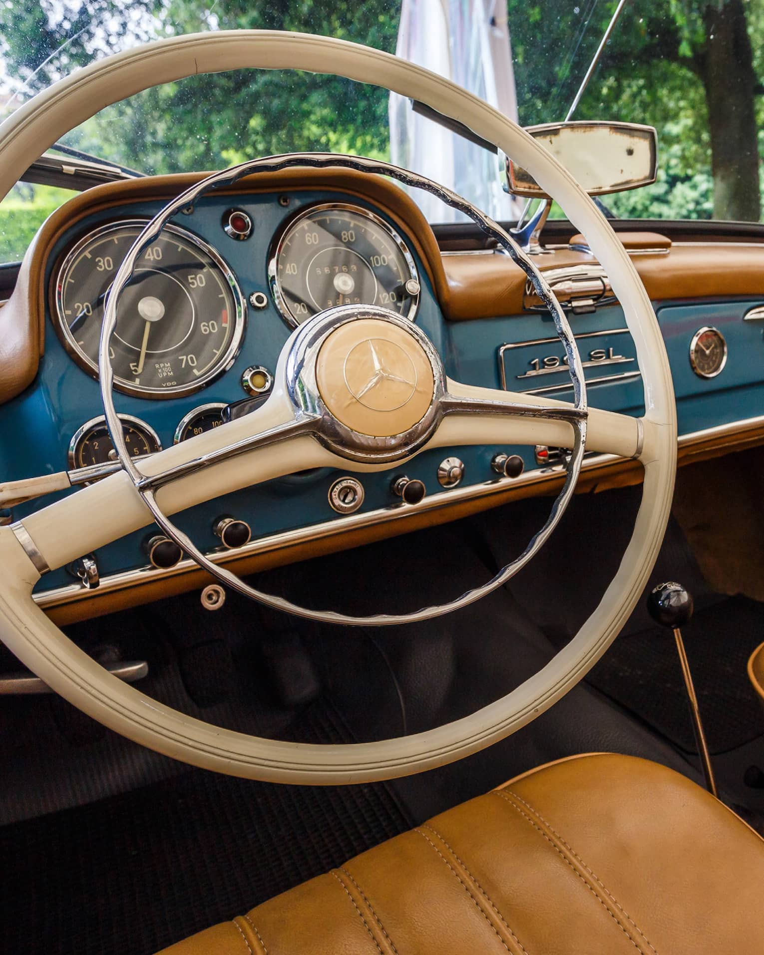 Wheel, dashboard, leather seats of classic luxury car