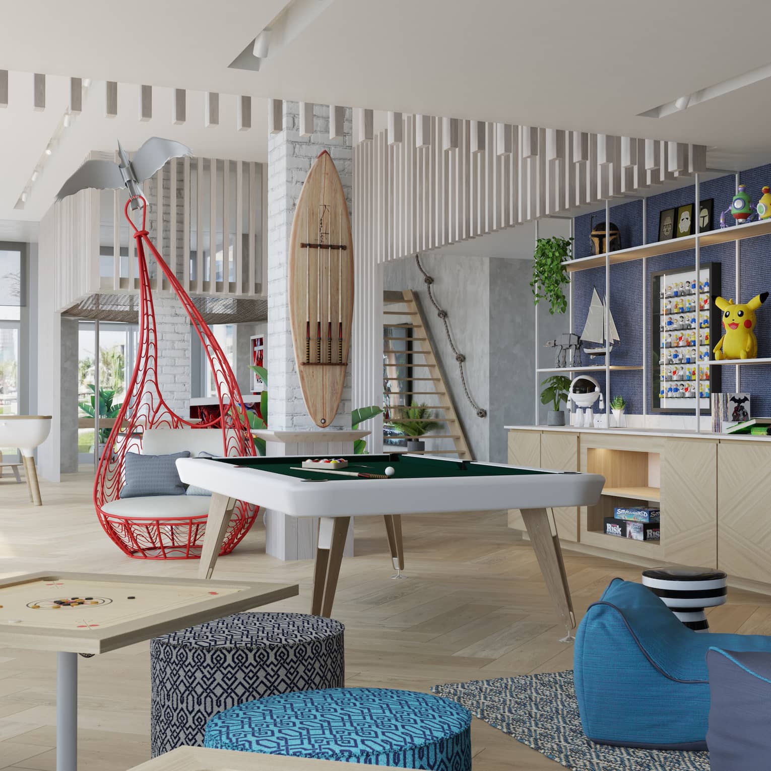 A large seating area with blue beanbag chairs, and hanging seats.