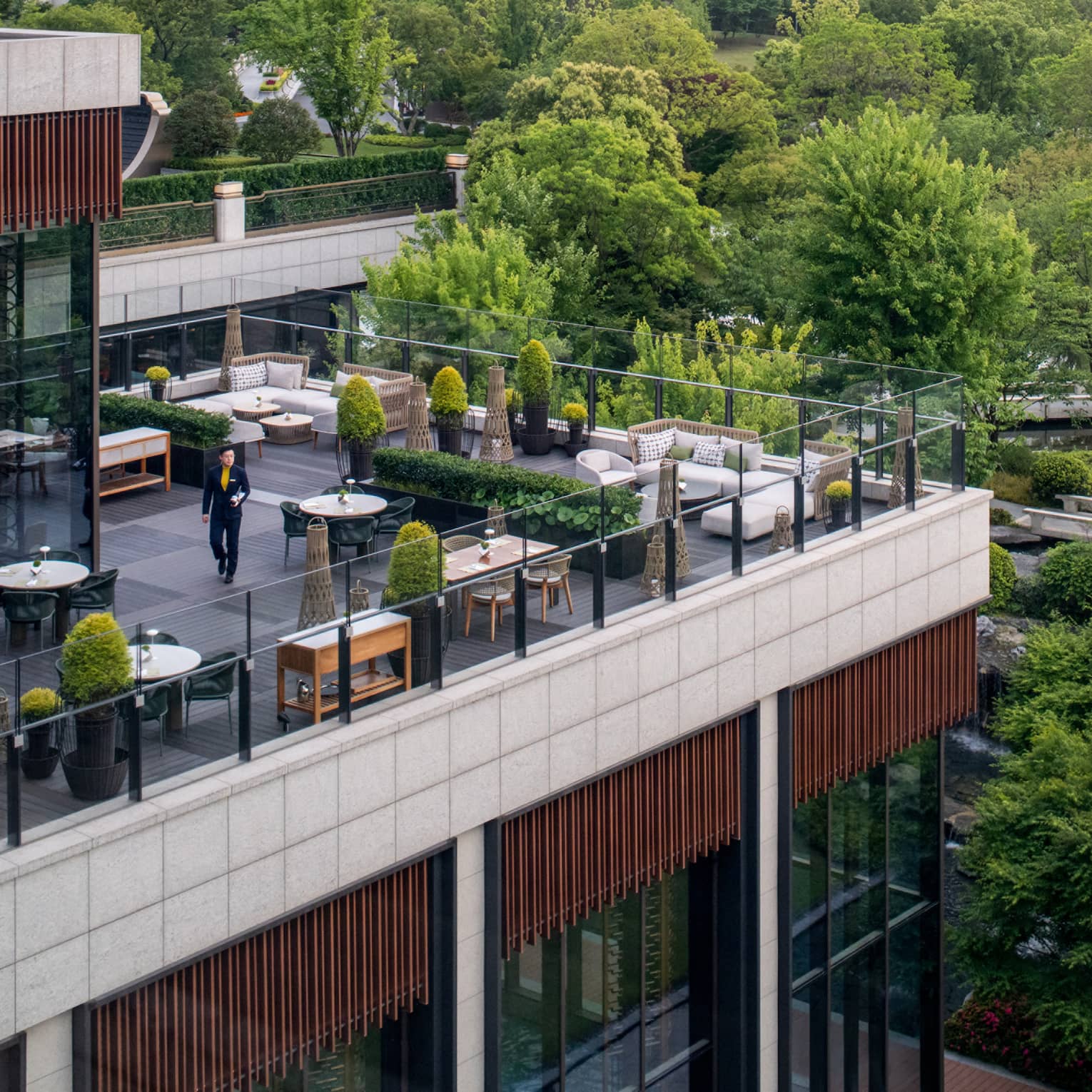 Exterior shot of elevated outdoor terrace restaurant at Four Seasons Hotel Suzhou