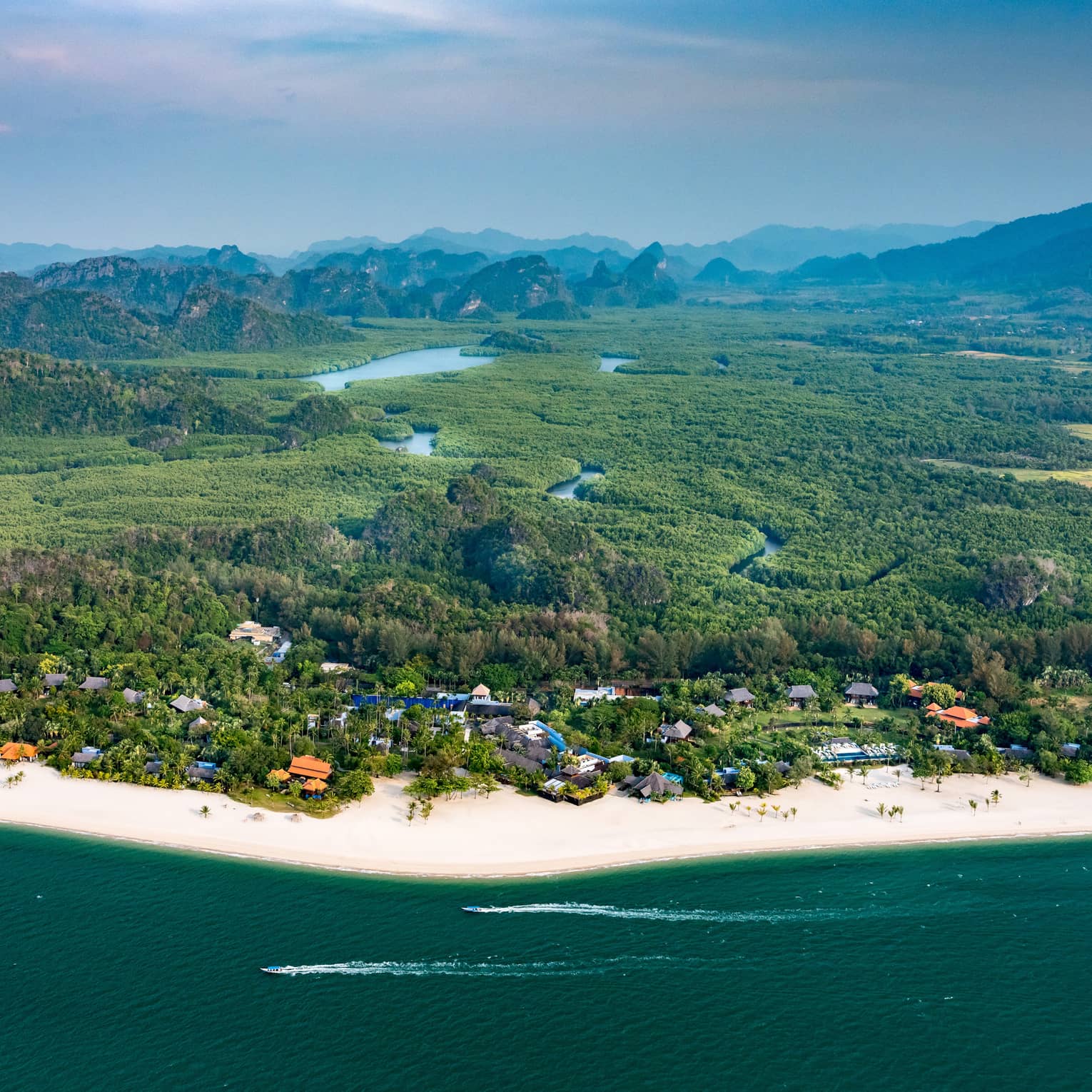 Aerial view of Four Seasons Langkawi Malaysia resort coastline, rainforest