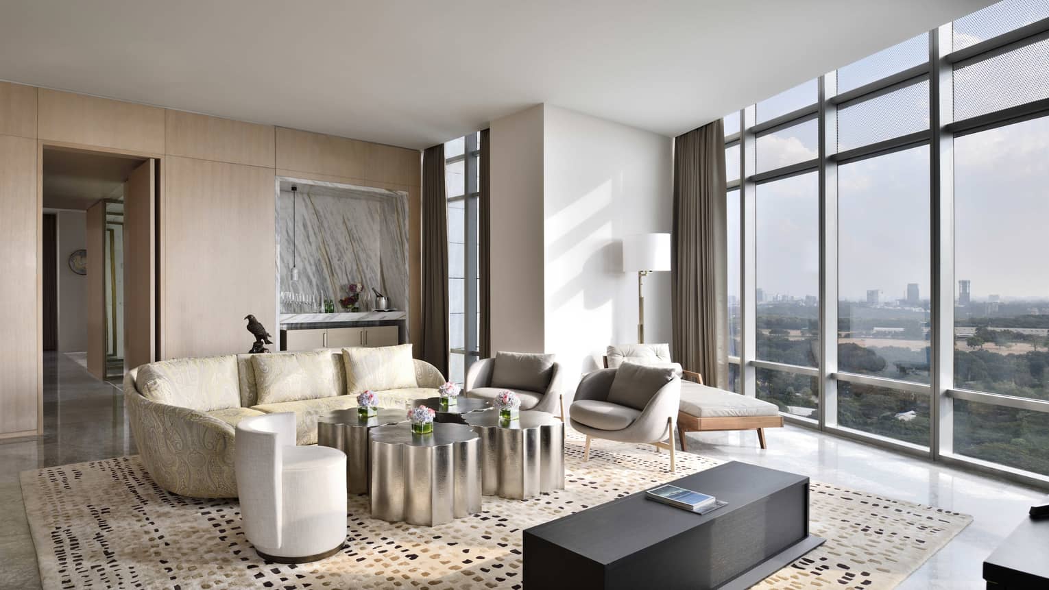 Living room with modern, metallic coffee table