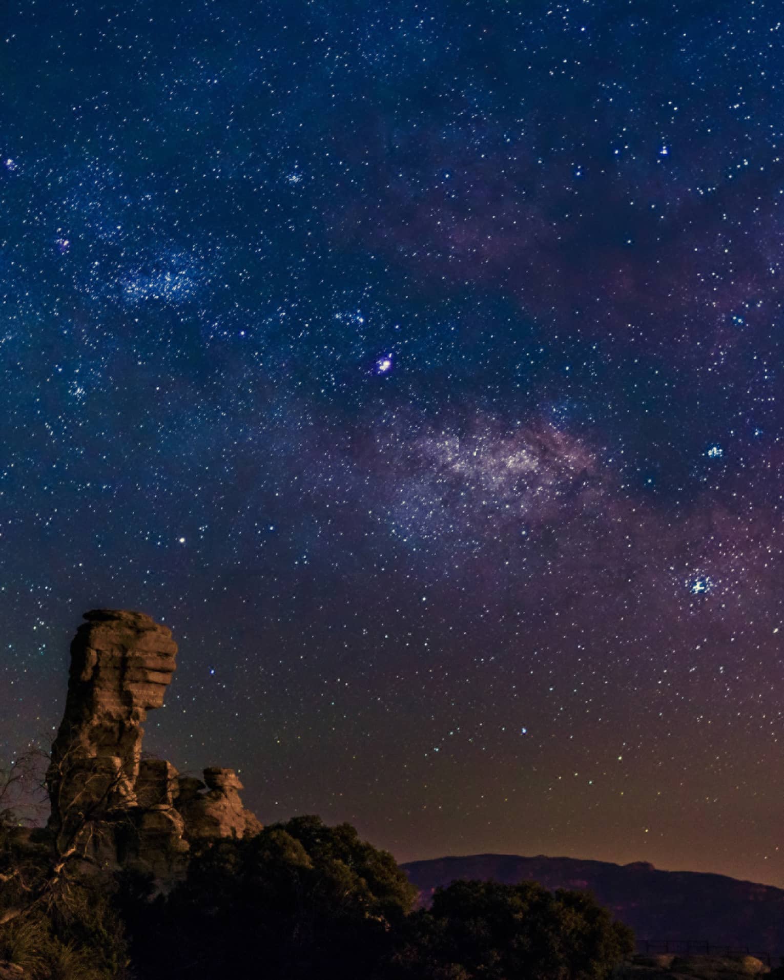 Clear, starry night sky over desert