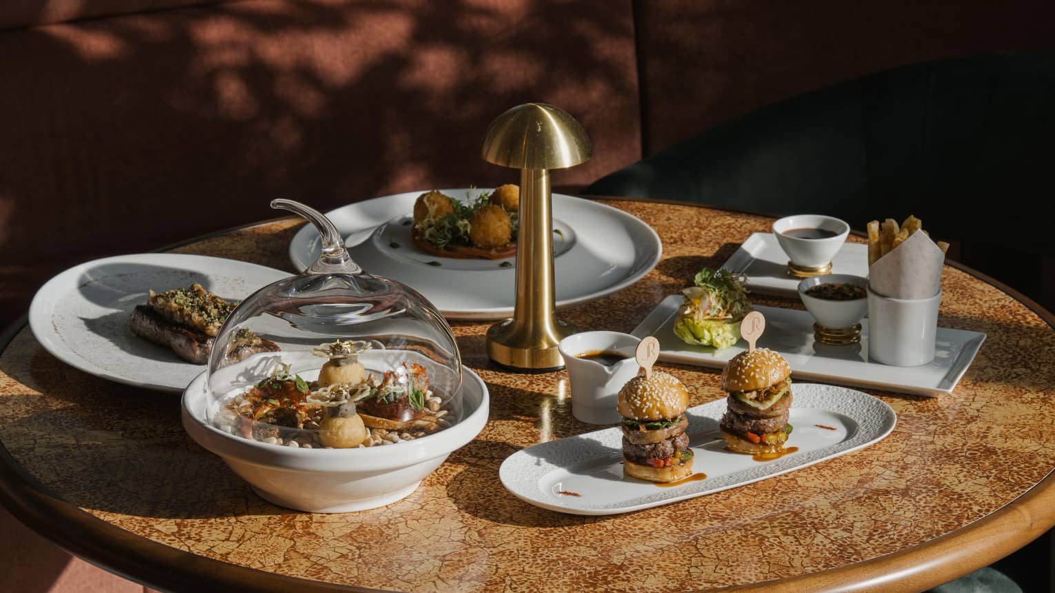 Round table filled with an assortment of food items