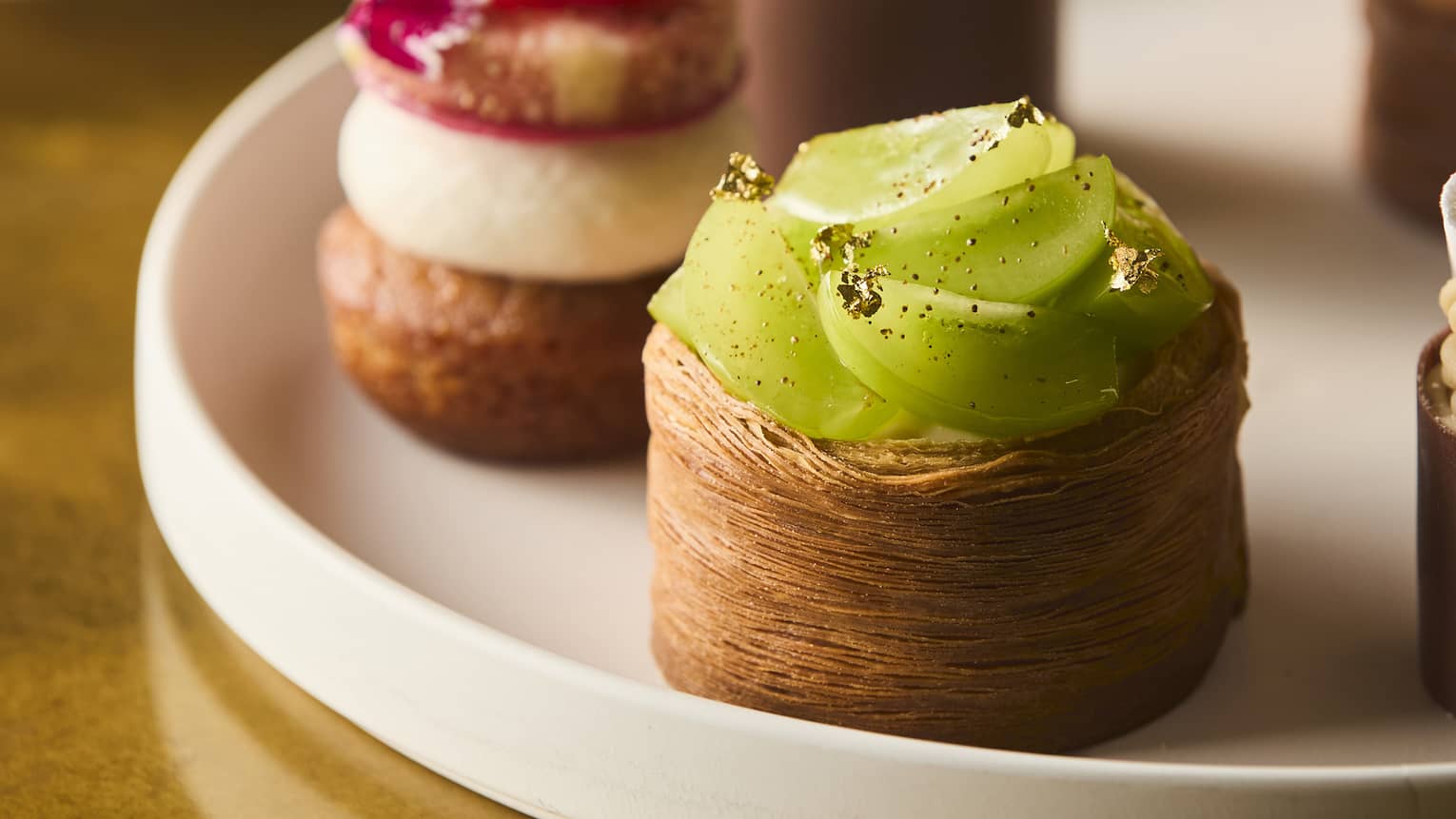 Afternoon tea gourmet sweets on a white plates