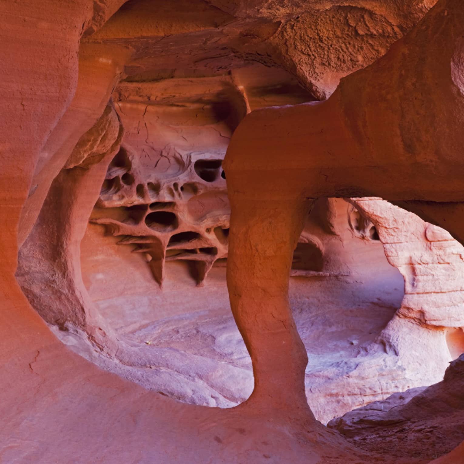 Trail through curved desert rock formations in Grand Canyon