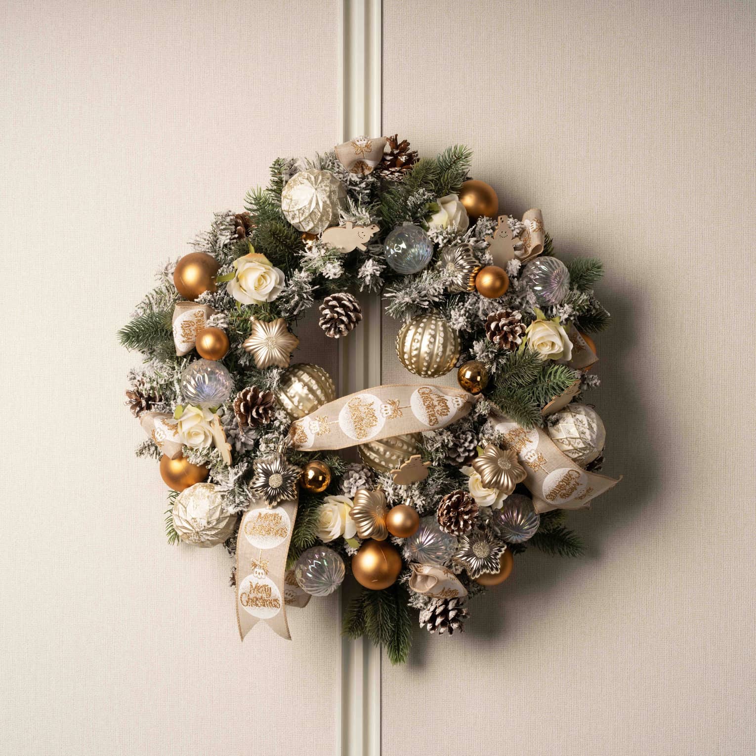 Christmas wreath with gold and white decorations at Four Seasons Hotel Kyoto