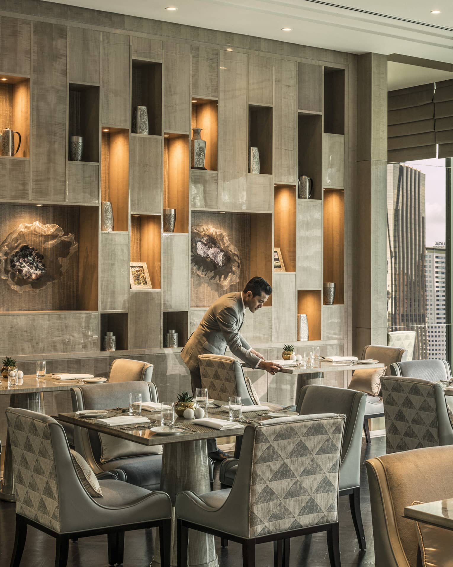 The Executive Club at Four Seasons Hotel Kuala Lumpur offers sleek seats and views of KLCC Park