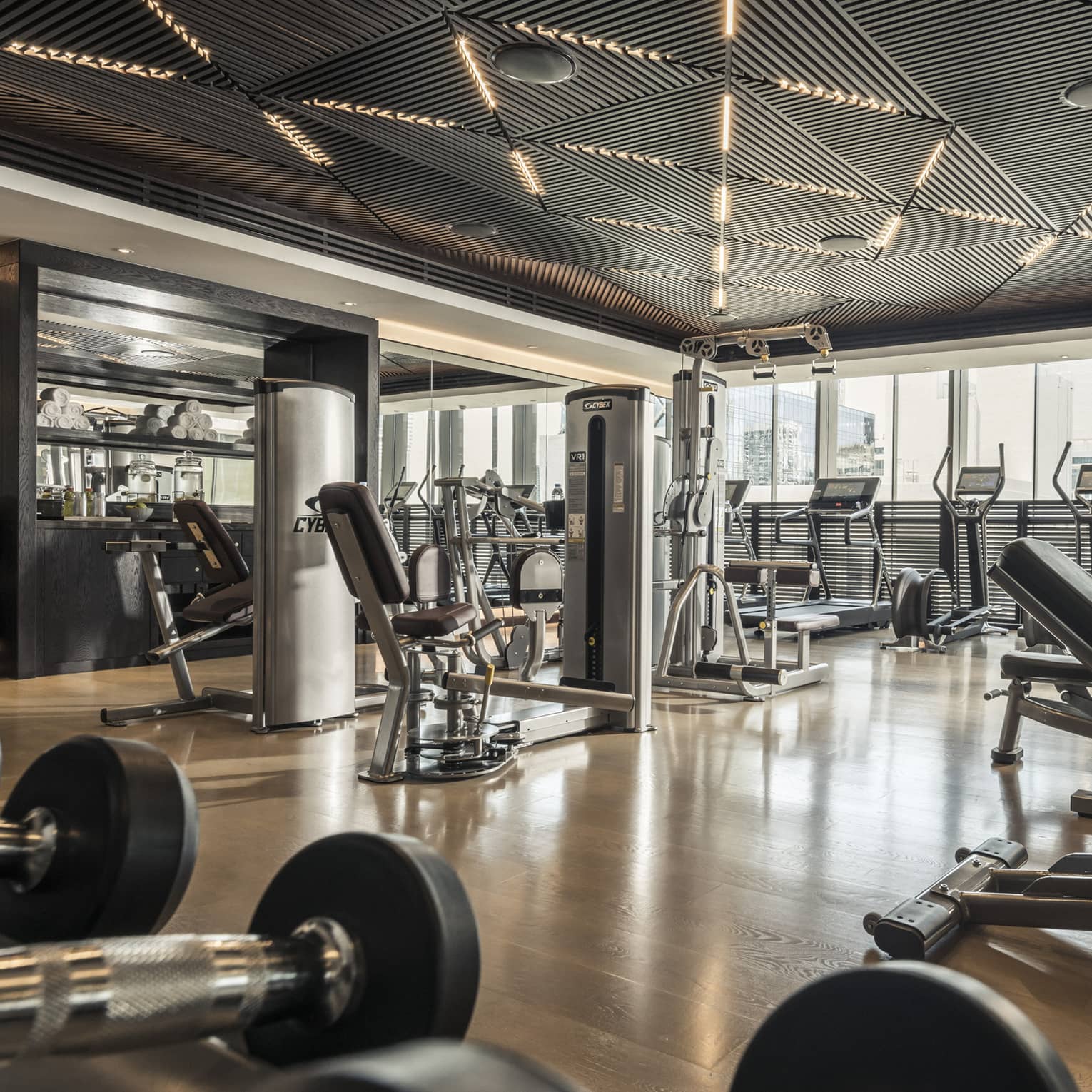 Cardio machines and weight stations line the Fitness Centre 