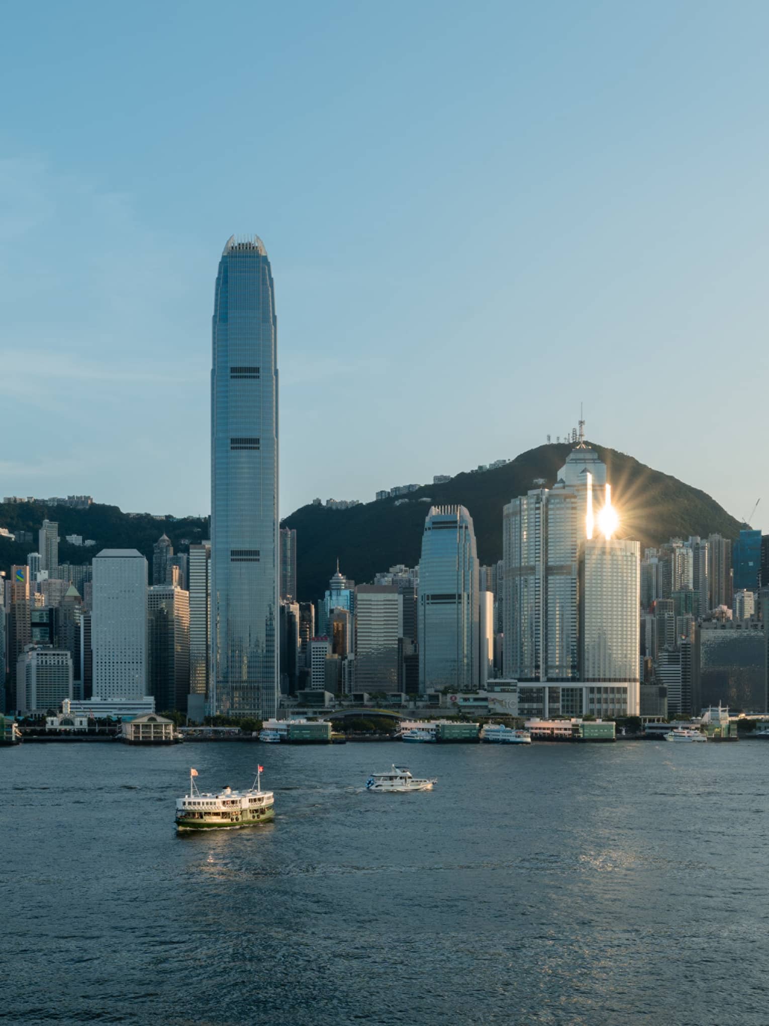 Boats on harbour and Hong Kong city in the background