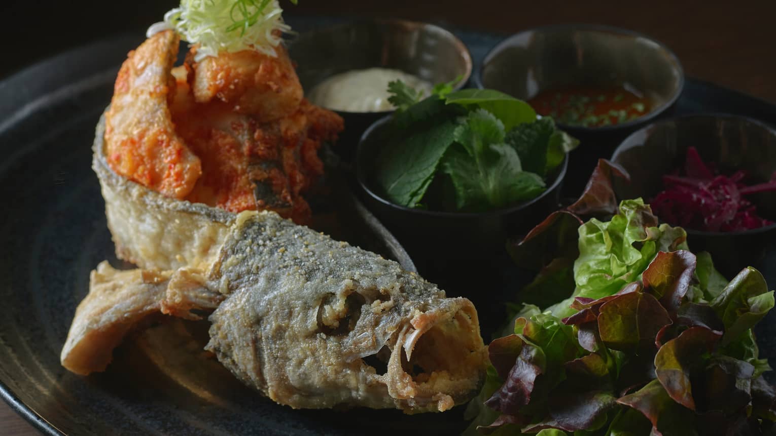 Whole Crunchy Sea Bass with Ssam Wrap, Herbs and Pickled Cabbage