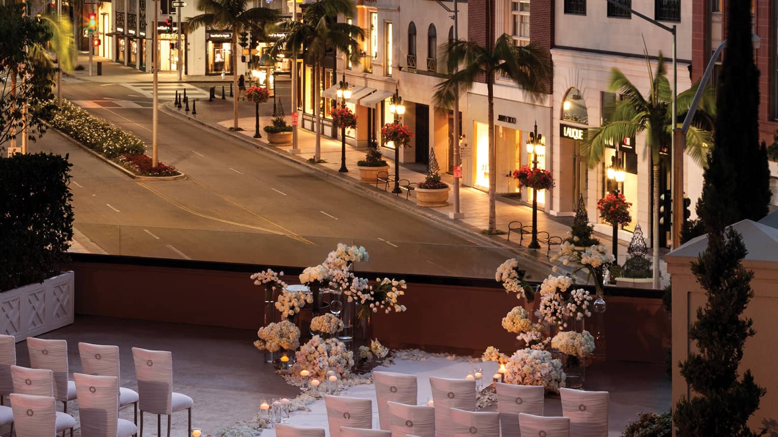 Wedding set up on terrace above Beverly Hills street view at sunset 