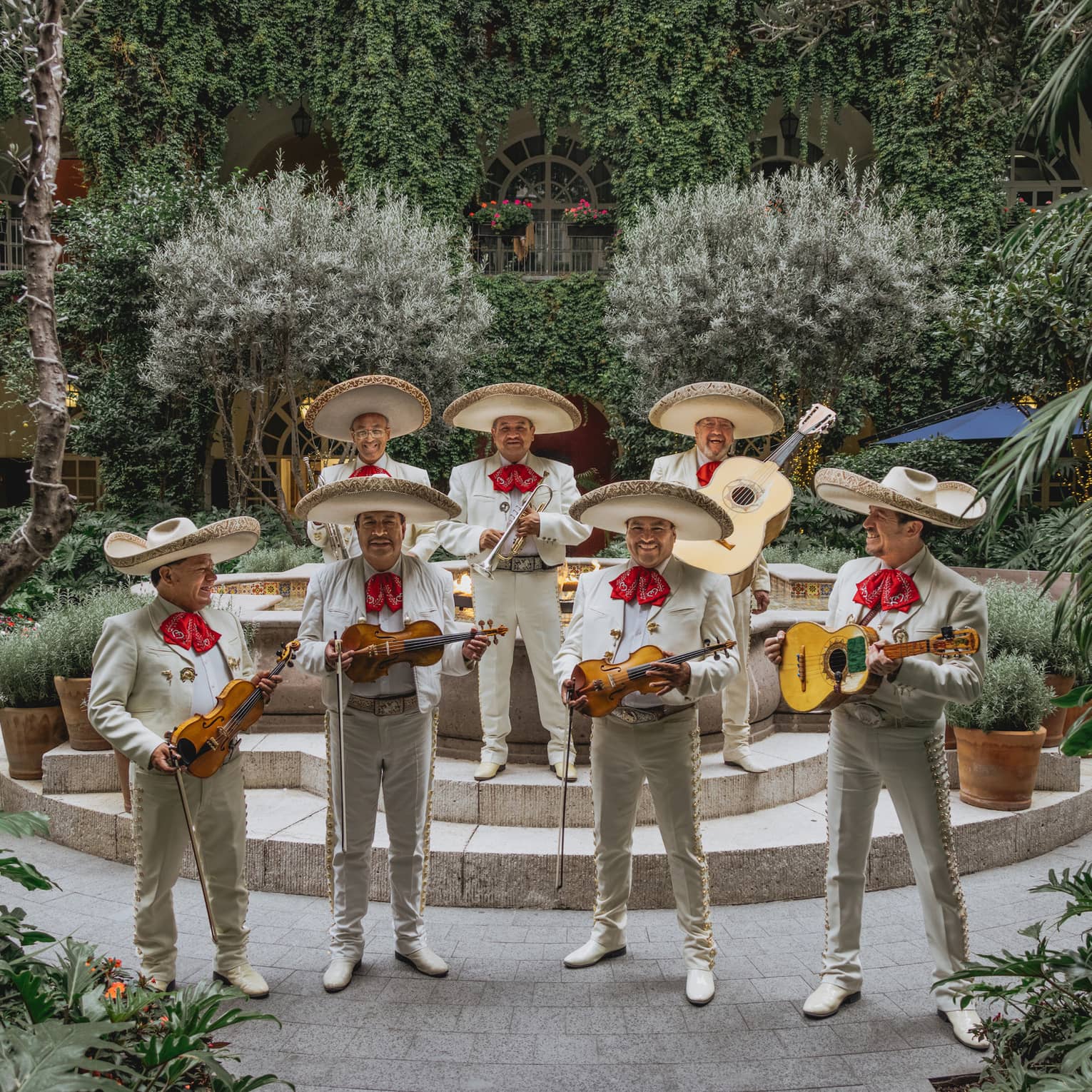 Mariachi band playing in a luxury hotel courtyard