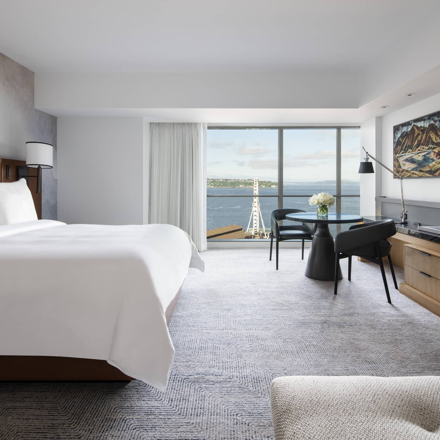 Deluxe Bay-View Rooms offer views of Elliott Bay through floor-to-ceiling windows