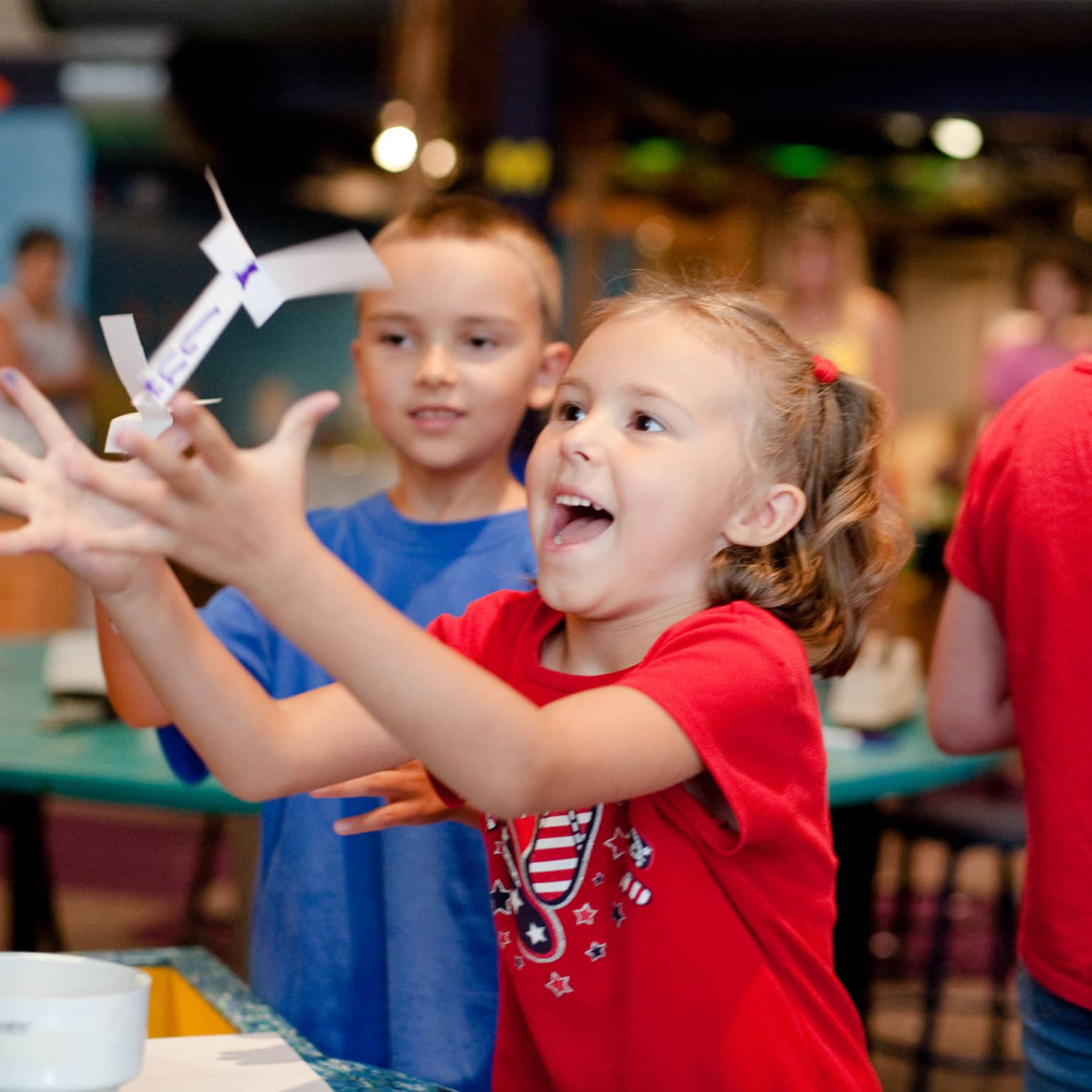 Children playing in an interactive museum exhibit