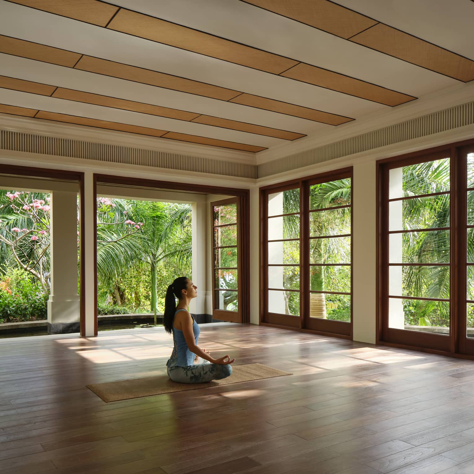 Woman sitting in a meditative pose