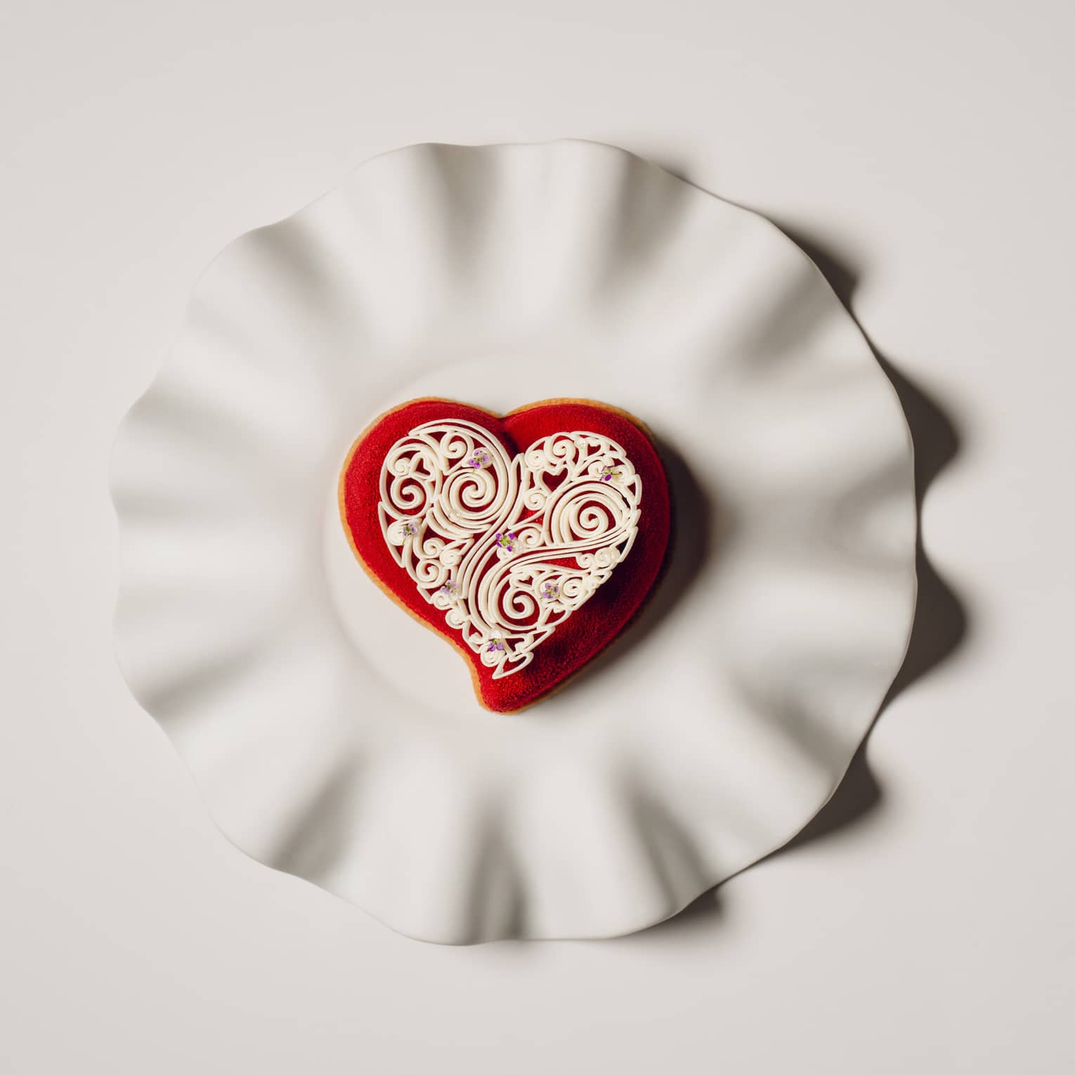 Red and white heart-shaped dessert