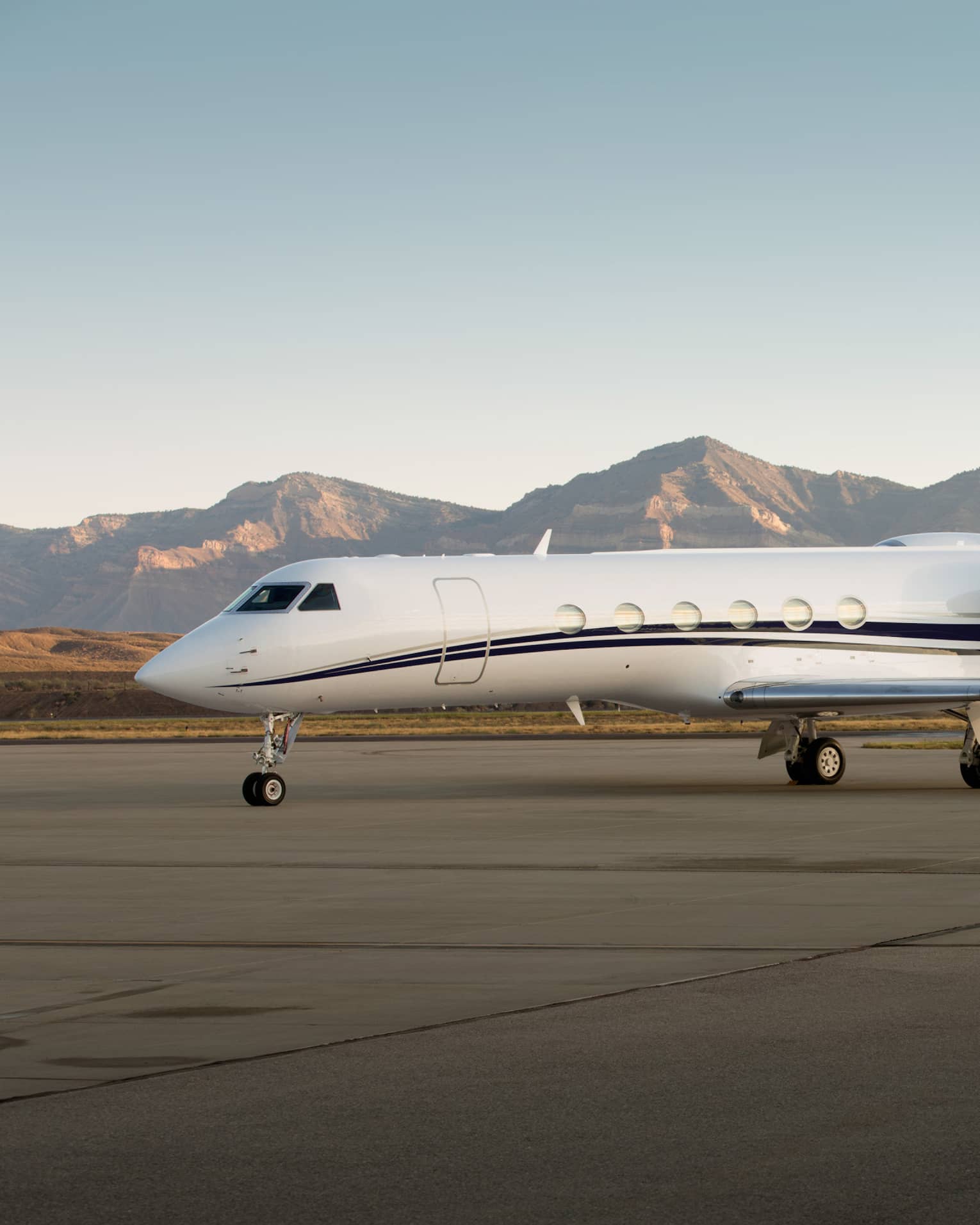 Jet Edge private jet parked on airport runway