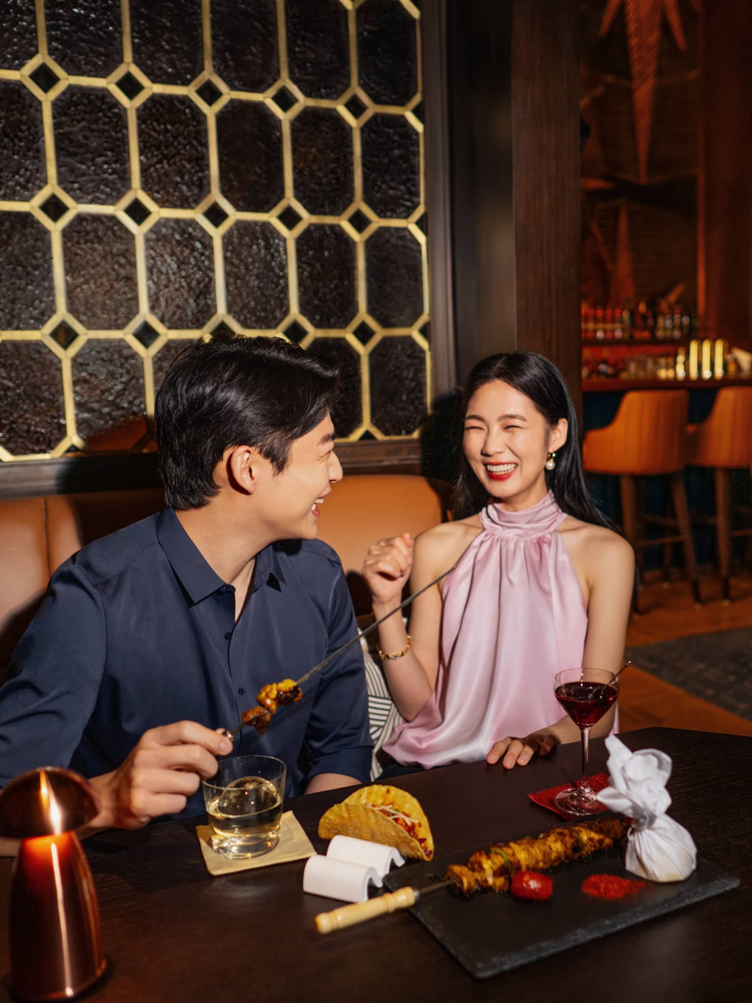 Man and woman enjoying a meal in Harbour Bar