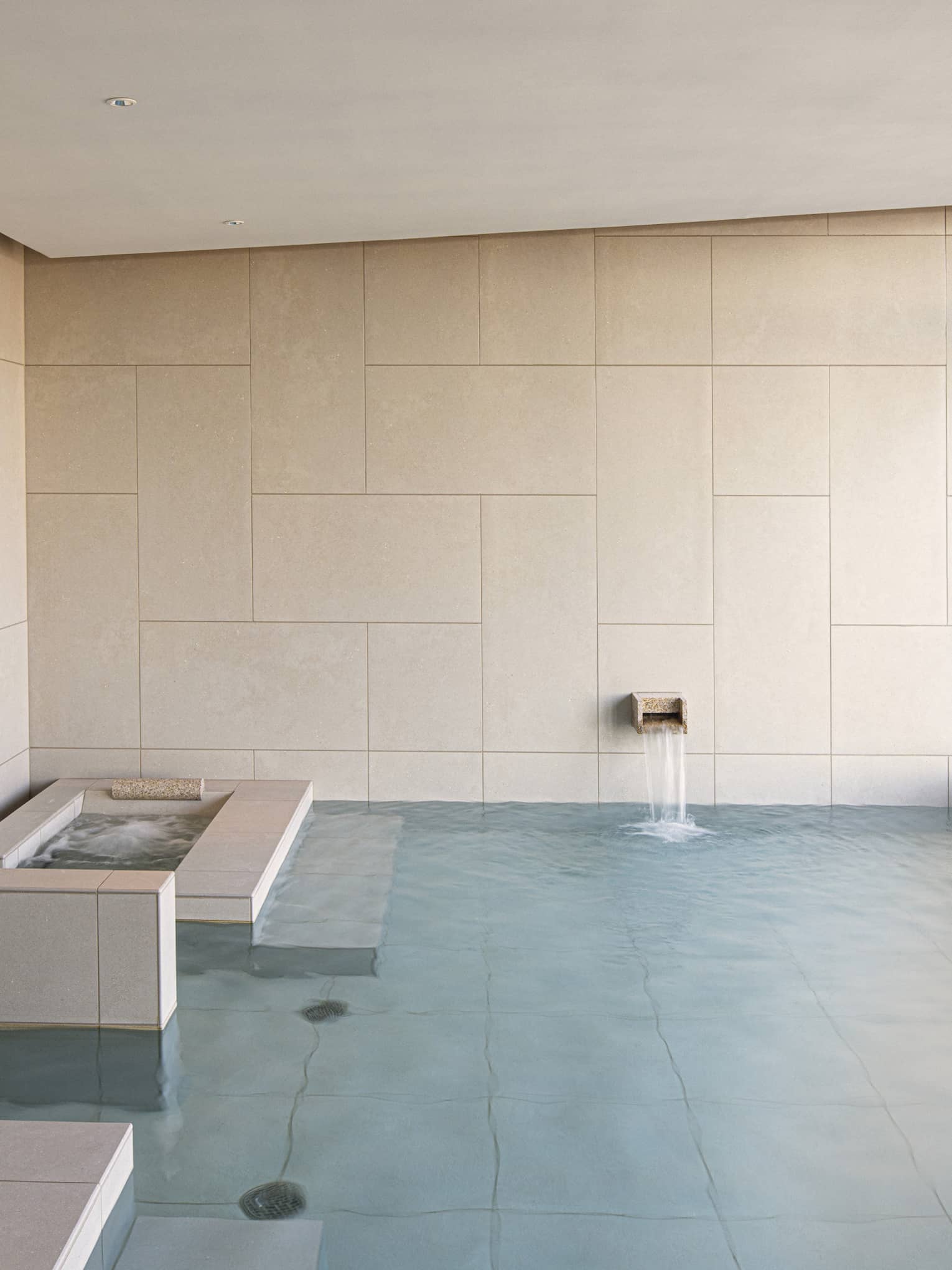 Four Seasons Hotel Osaka Japanese ofuro tub with wall of windows looking out to Osaka city