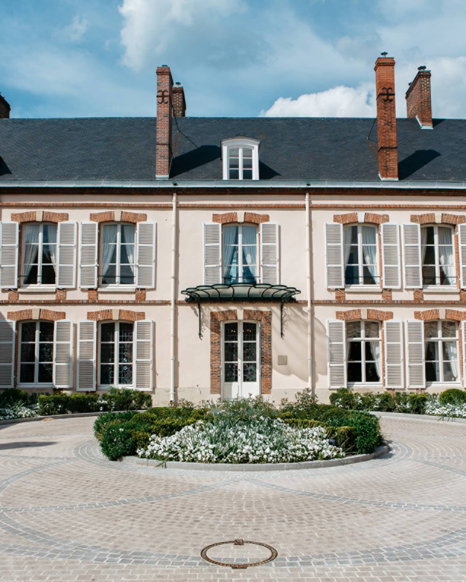 Rear courtyard view of the Maison Belle �poque 19th-century mansion