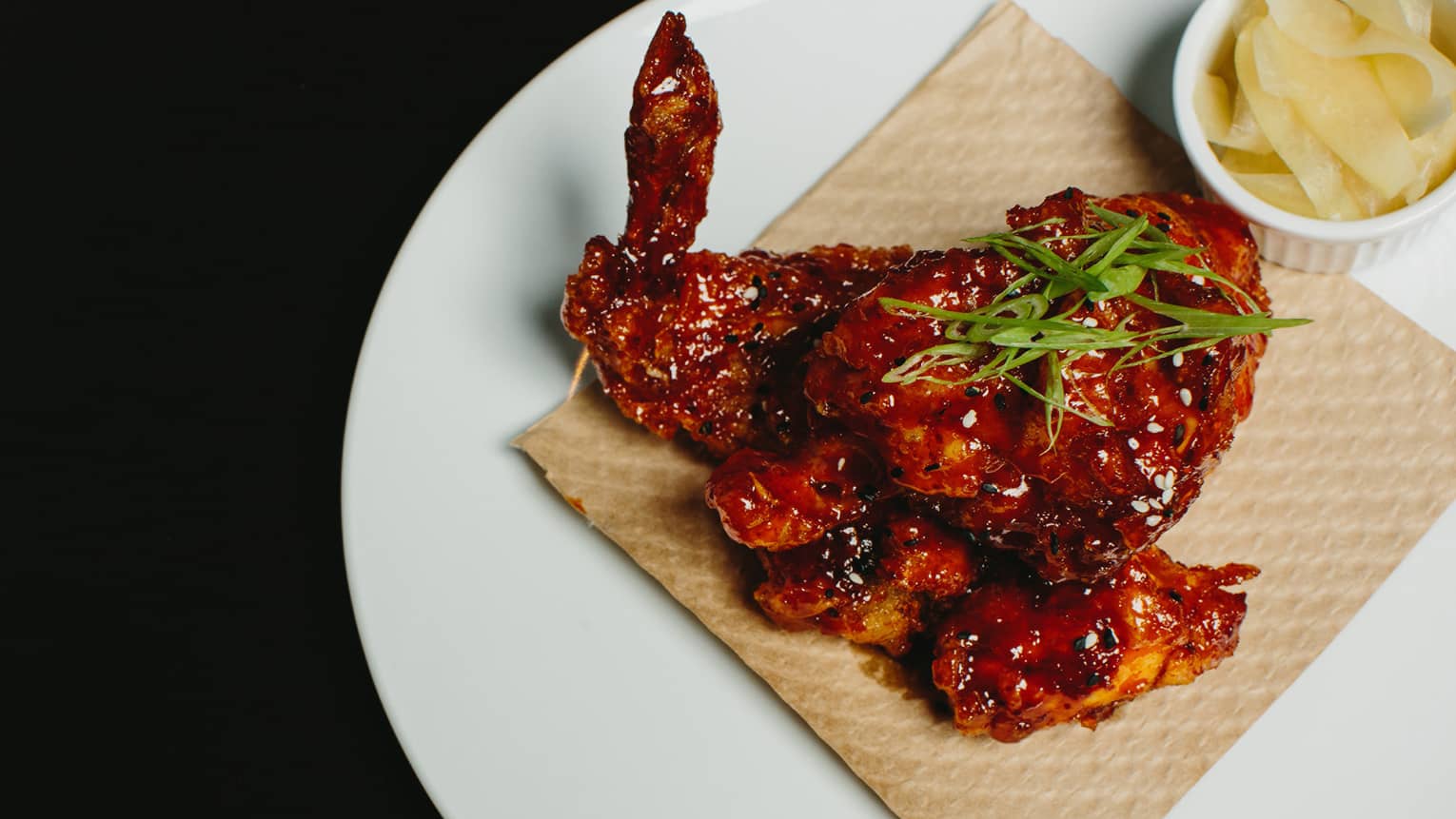 Bar Margot twice fried chicken with glaze on plate